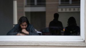 Person looking for a detained relative at a government building.